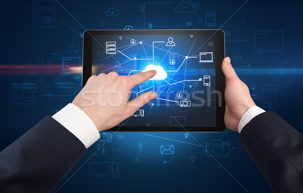 First person view of tablet with cloud office concept Stock photo © ra2studio