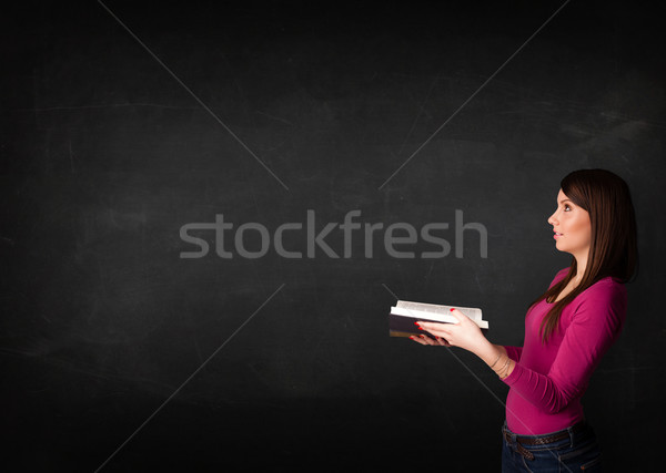 Young lady reading a book Stock photo © ra2studio