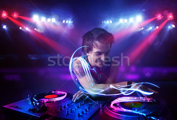 [[stock_photo]]: Disc-jockey · jouer · musique · lumière · poutre · effets