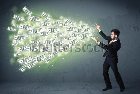 Business person throwing a lot of dollar bills concept Stock photo © ra2studio