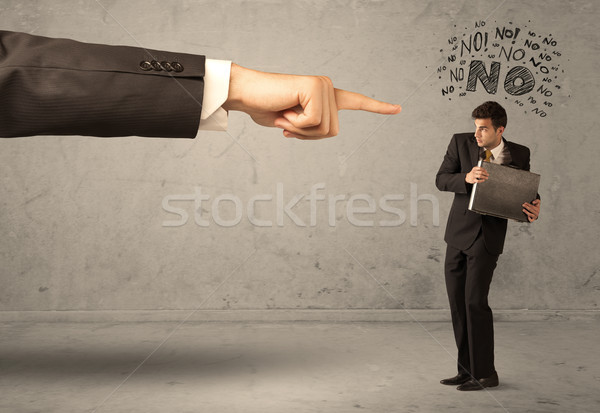 Boss hand guiding beginner salesman Stock photo © ra2studio