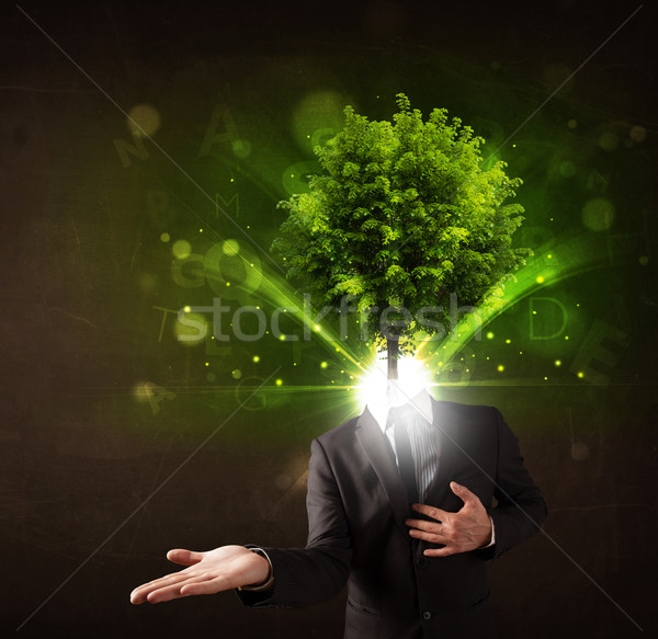 Man with green tree head concept Stock photo © ra2studio