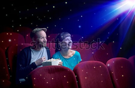 Lovely couple watching 3D movie Stock photo © ra2studio