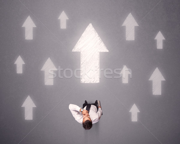 Geschäftsmann Entscheidung jungen weiß Pfeile Stock foto © ra2studio