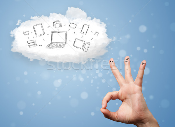 Happy cheerful smiley fingers looking at cloud computing with technology icons Stock photo © ra2studio