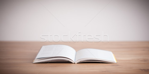 Stock photo: Open Book on wood background