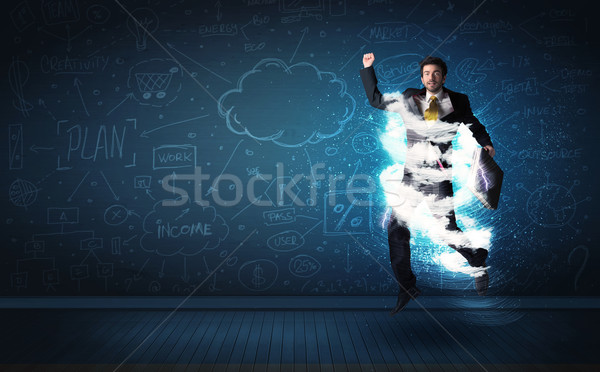 Heureux homme d'affaires sautant tempête nuage autour [[stock_photo]] © ra2studio