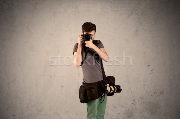 Hobby photographer holding camera Stock photo © ra2studio