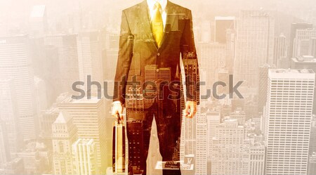 Business man looking at overlay city background Stock photo © ra2studio