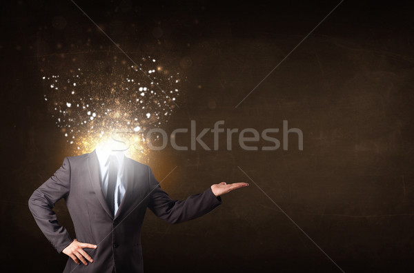 Business man with glowing exploding head Stock photo © ra2studio