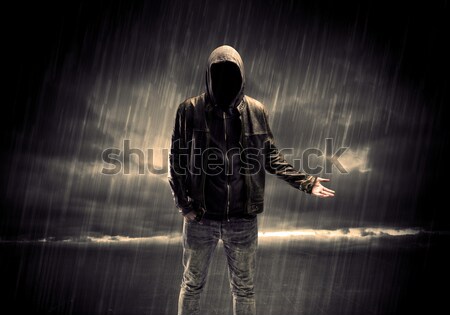 Terrorist in a room with weapons on his hand Stock photo © ra2studio