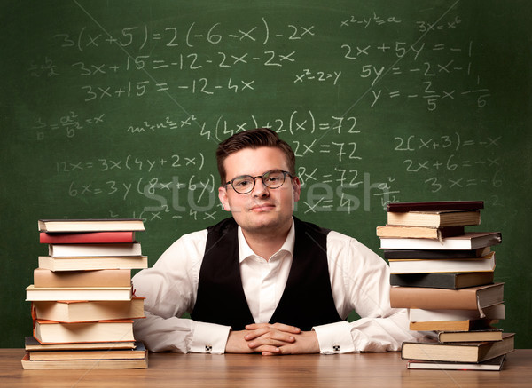 Math teacher at desk stock photo © Rancz Andrei (ra2studio)