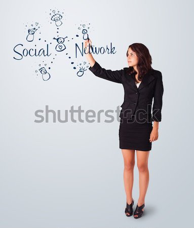 Woman draving social network theme on whiteboard Stock photo © ra2studio