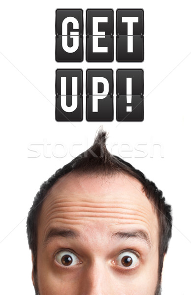 Funny Young man with get up sign over head Stock photo © ra2studio