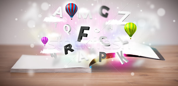 Otwarta księga pływające 3D litery konkretnych kolorowy Zdjęcia stock © ra2studio
