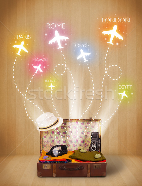 Viaggio bag vestiti colorato aerei battenti Foto d'archivio © ra2studio