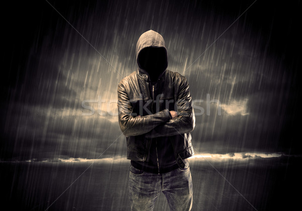 Anonymous terrorist in hoodie at night Stock photo © ra2studio