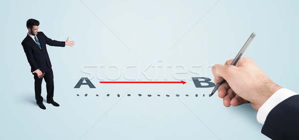 Businessman looking at red line from a to b drawn by hand Stock photo © ra2studio