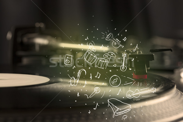 Turntable playing classical music with icon drawn instruments  Stock photo © ra2studio