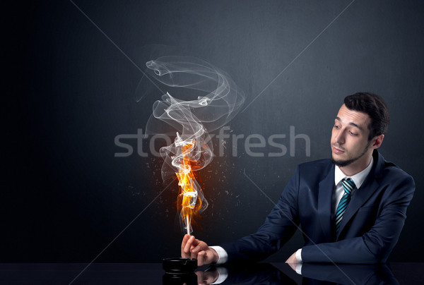 Biznesmen palenia piekło efekt ognia człowiek Zdjęcia stock © ra2studio