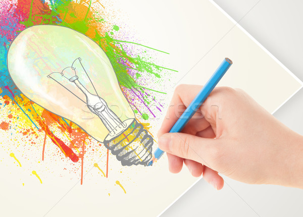 Main dessin papier coloré éclaboussures ampoule [[stock_photo]] © ra2studio