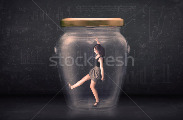Businesswoman shut inside a glass jar concept Stock photo © ra2studio