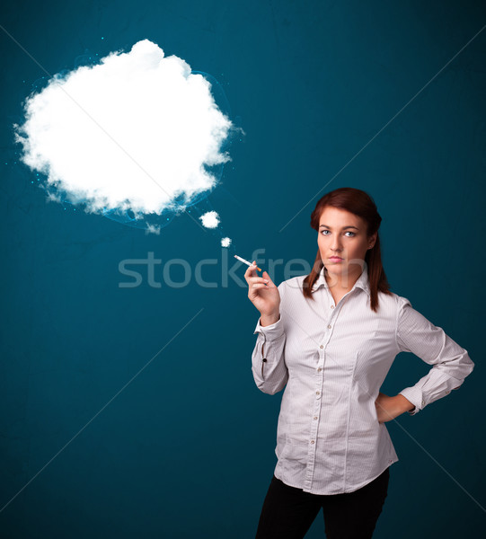 Młoda kobieta palenia niezdrowy papierosów gęsty dymu Zdjęcia stock © ra2studio