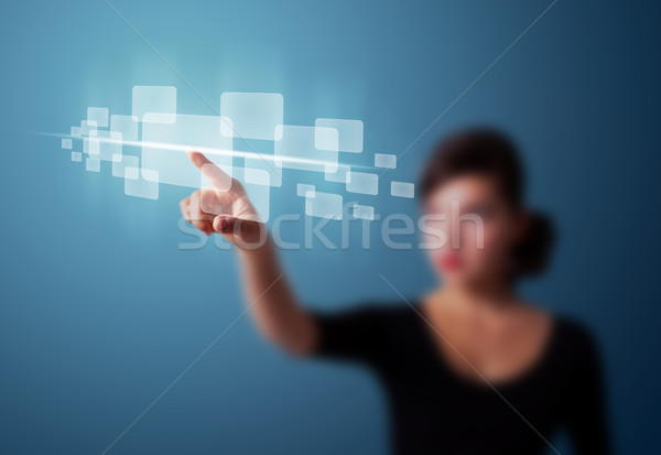 Businesswoman pressing high tech type of modern buttons Stock photo © ra2studio