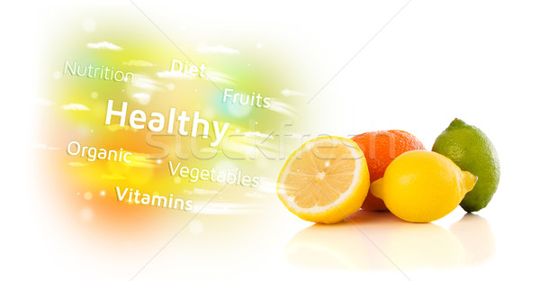 Colorful juicy fruits with healthy text and signs  Stock photo © ra2studio