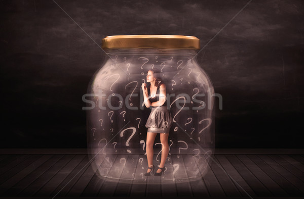 Imprenditrice bloccato jar punti interrogativi vetro triste Foto d'archivio © ra2studio