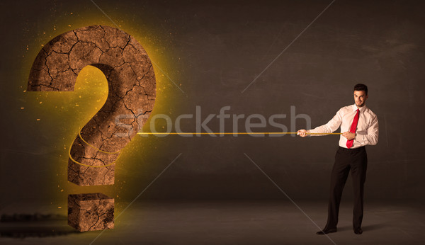 Człowiek biznesu duży solidny znak zapytania kamień Zdjęcia stock © ra2studio