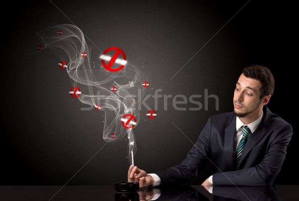Businessman smoking concept Stock photo © ra2studio