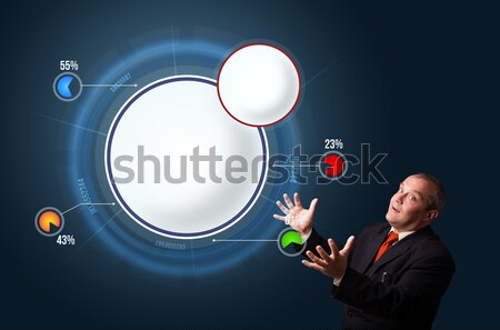 funny businessman in suit presenting abstract modern pie chart Stock photo © ra2studio