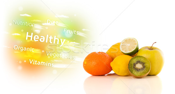 Colorful juicy fruits with healthy text and signs  Stock photo © ra2studio