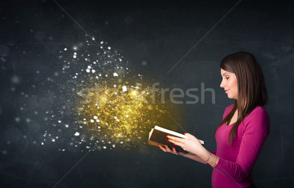 Jeunes dame lecture livre tableau noir [[stock_photo]] © ra2studio