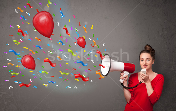 Foto stock: Jovem · megafone · balões · confete