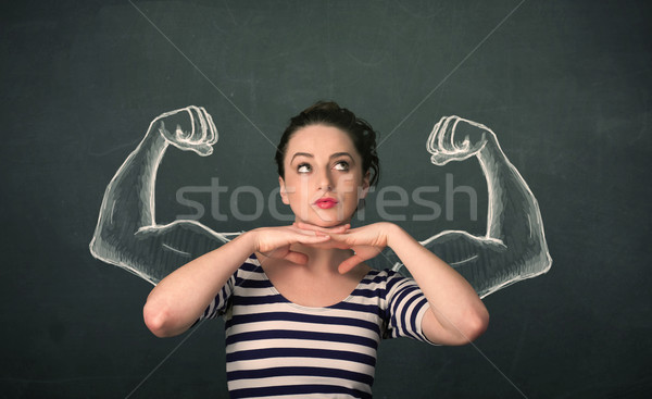 Stock photo: woman with sketched strong and muscled arms