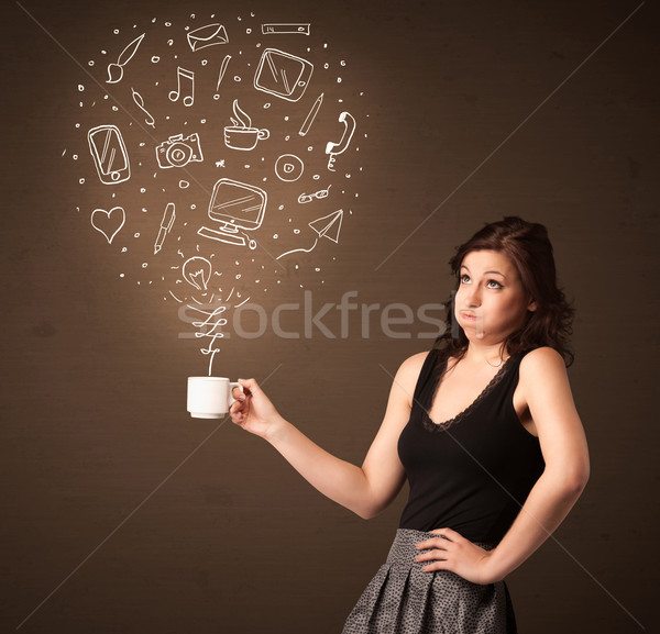 Businesswoman holding a white cup with social media icons Stock photo © ra2studio