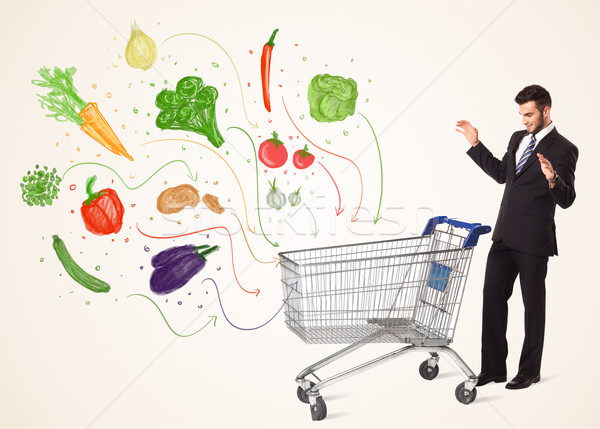 üzletember bevásárlókocsi zöldségek toló egészséges ki Stock fotó © ra2studio