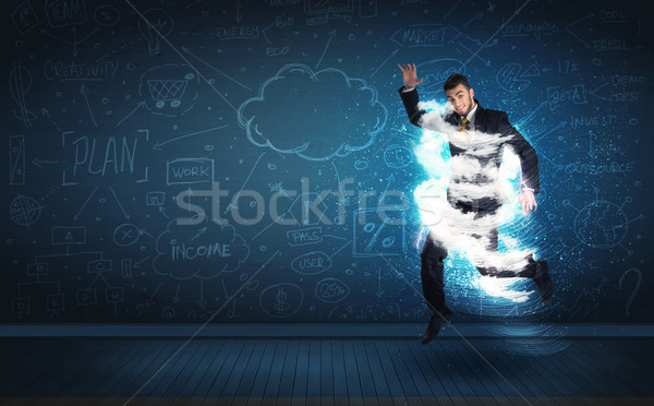 Heureux homme d'affaires sautant tempête nuage autour [[stock_photo]] © ra2studio