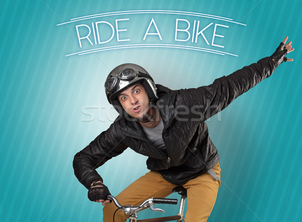 Nutty cyclist on his bike Stock photo © ra2studio