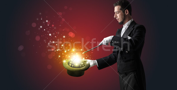 Branco mão meio luva algo misterioso Foto stock © ra2studio
