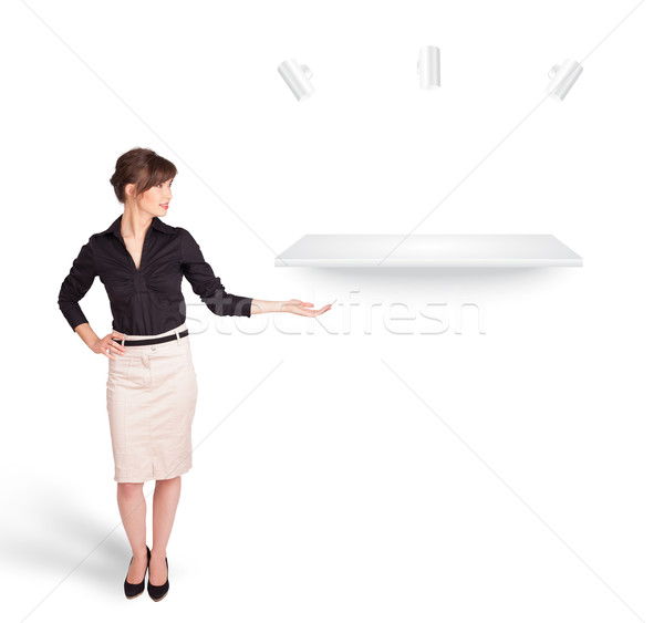 Beutiful young woman presenting modern copy space Stock photo © ra2studio