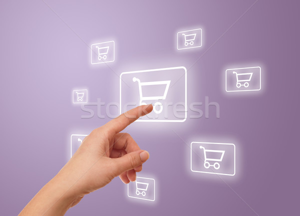 hand pressing shopping cart icon Stock photo © ra2studio