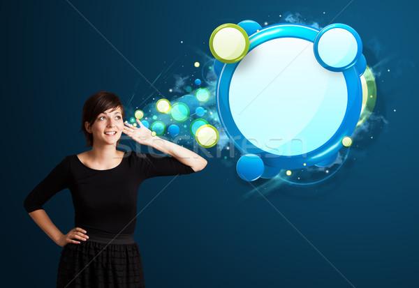 Young woman with abstract modern speech bubble Stock photo © ra2studio