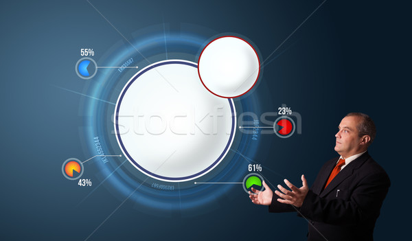 businessman in suit presenting abstract modern pie chart Stock photo © ra2studio