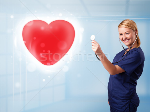 [[stock_photo]]: Jeunes · infirmière · guérison · rouge · coeur · joli