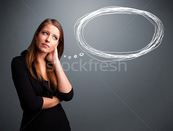 Beautiful young lady thinking about speech or thought bubble Stock photo © ra2studio