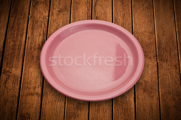 Colorful empty plate on grungy background table  Stock photo © ra2studio