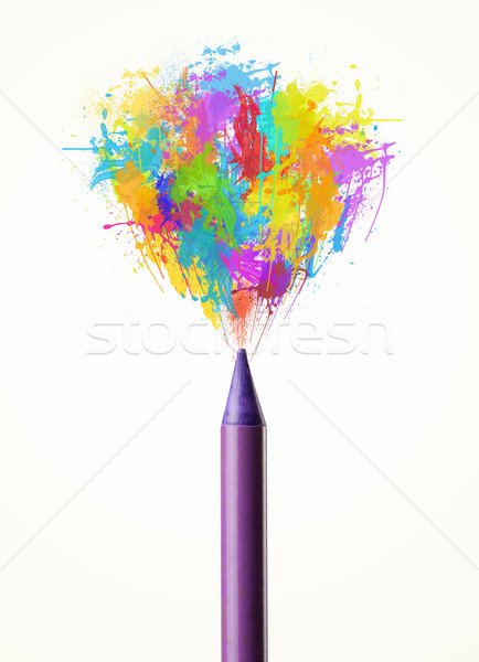 Pencil close-up with colored paint splashes Stock photo © ra2studio